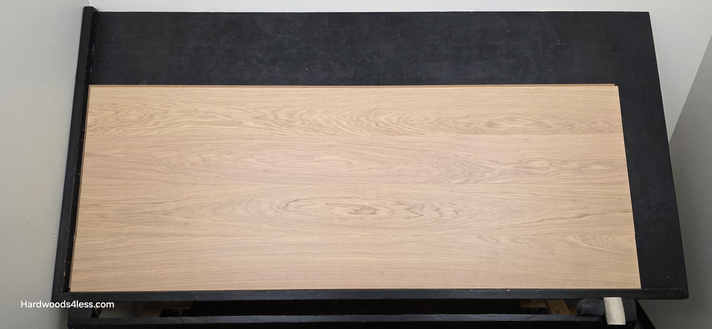 8.11" x 7/16" Modernized Engineered European Oak Gropius Hardened Hardwood Flooring. Shown on a black shooting table. Shot from center.