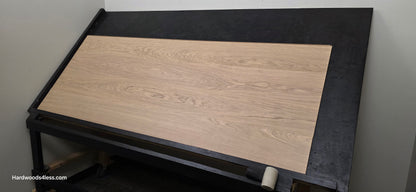 8.11" x 7/16" Modernized Engineered European Oak Gropius Hardened Hardwood Flooring. Shown on a black shooting table. Shot from wide right. 