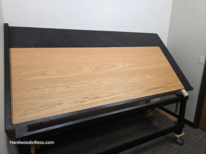 8.11" x 7/16" Modernized Engineered European Oak Hadid Hardened Hardwood Flooring. Shown on a black shooting table. Shot from wide left. 