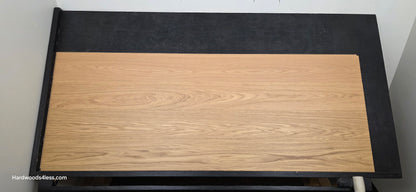 8.11" x 7/16" Modernized Engineered European Oak Hadid Hardened Hardwood Flooring. Shown on a black shooting table. Shot from center.