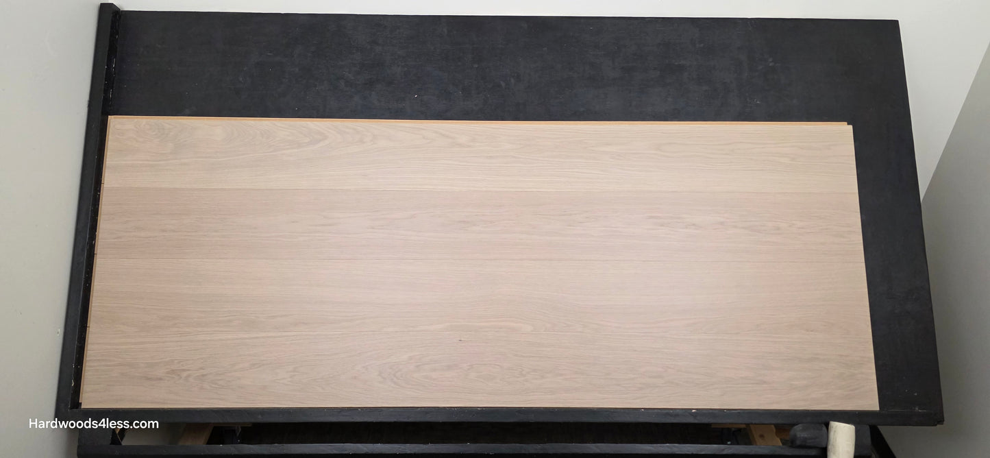 8.11" x 7/16" Modernized Engineered European Oak Foster Hardened Hardwood Flooring. Shown on a black shooting table. Shot from center.