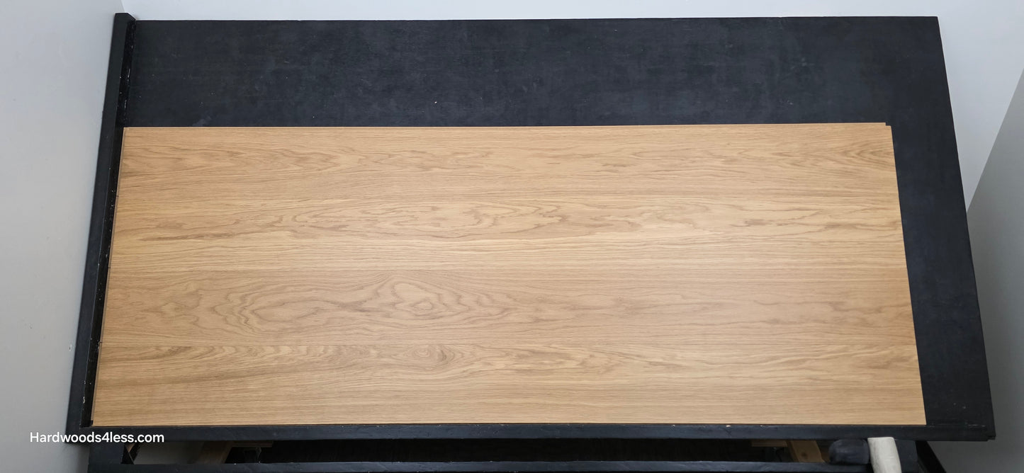 8.11" x 7/16" Modernized Engineered European Oak Wright Hardened Hardwood Flooring. Shown on a black shooting table. Shot from center.
