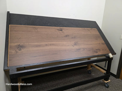 8.11" x 7/16" Modernized Engineered Walnut Calatrava Hardened Hardwood Flooring. Shown on a black shooting table. Shot from wide left. 