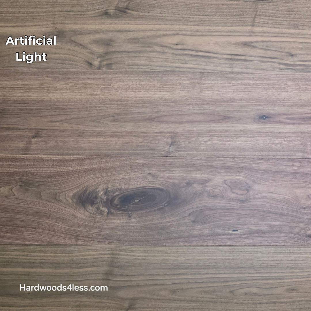 8.11" x 7/16" Modernized Engineered Walnut Wright Hardened Hardwood Flooring. Shown in artificial lighting.