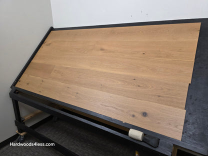 8.66" x 5/8" Engineered European Oak Pacific Grove Hardwood Flooring. Shown on a black shooting table. Shot from wide right.