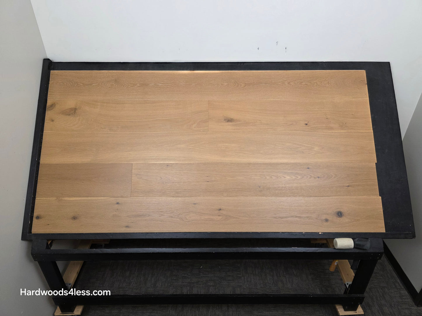 8.66" x 5/8" Engineered European Oak Pacific Grove Hardwood Flooring. Shown on a black shooting table. Shot from center.