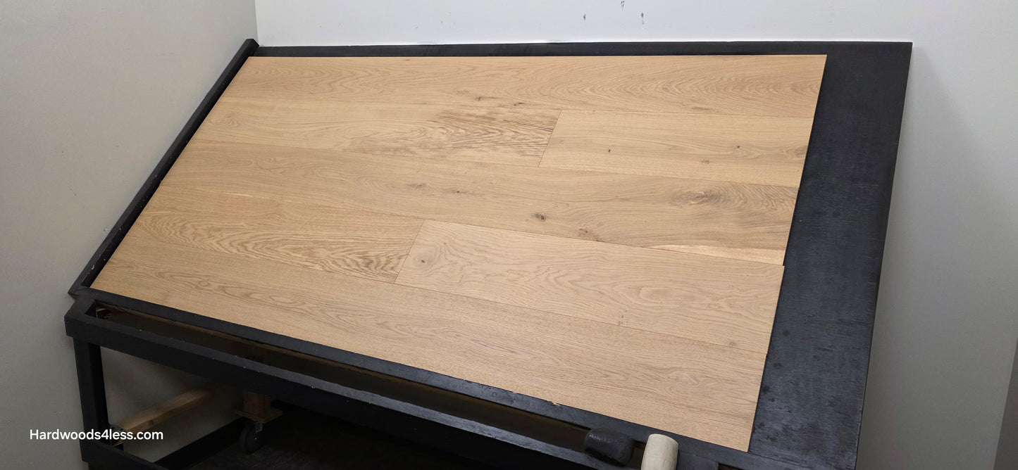 8.66" x 5/8" Engineered European Oak Pismo Stain Hardwood Flooring. Shown on a black shooting table. Shot from wide right.