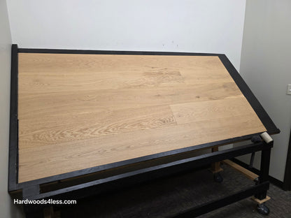 8.66" x 5/8" Engineered European Oak Pismo Stain Hardwood Flooring. Shown on a black shooting table. Shot from wide left.