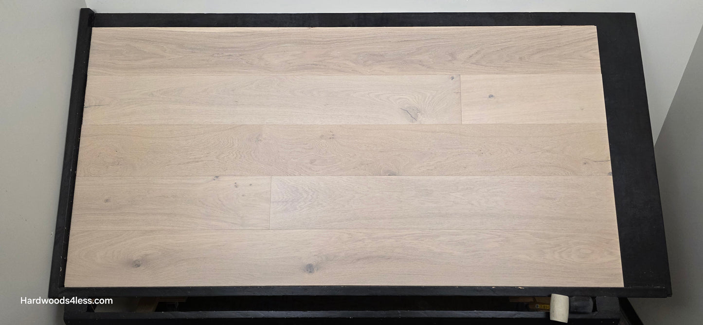 8.66" x 5/8" Engineered European Oak Solana Stain Hardwood Flooring. Shown on a black shooting table. Shot from center.