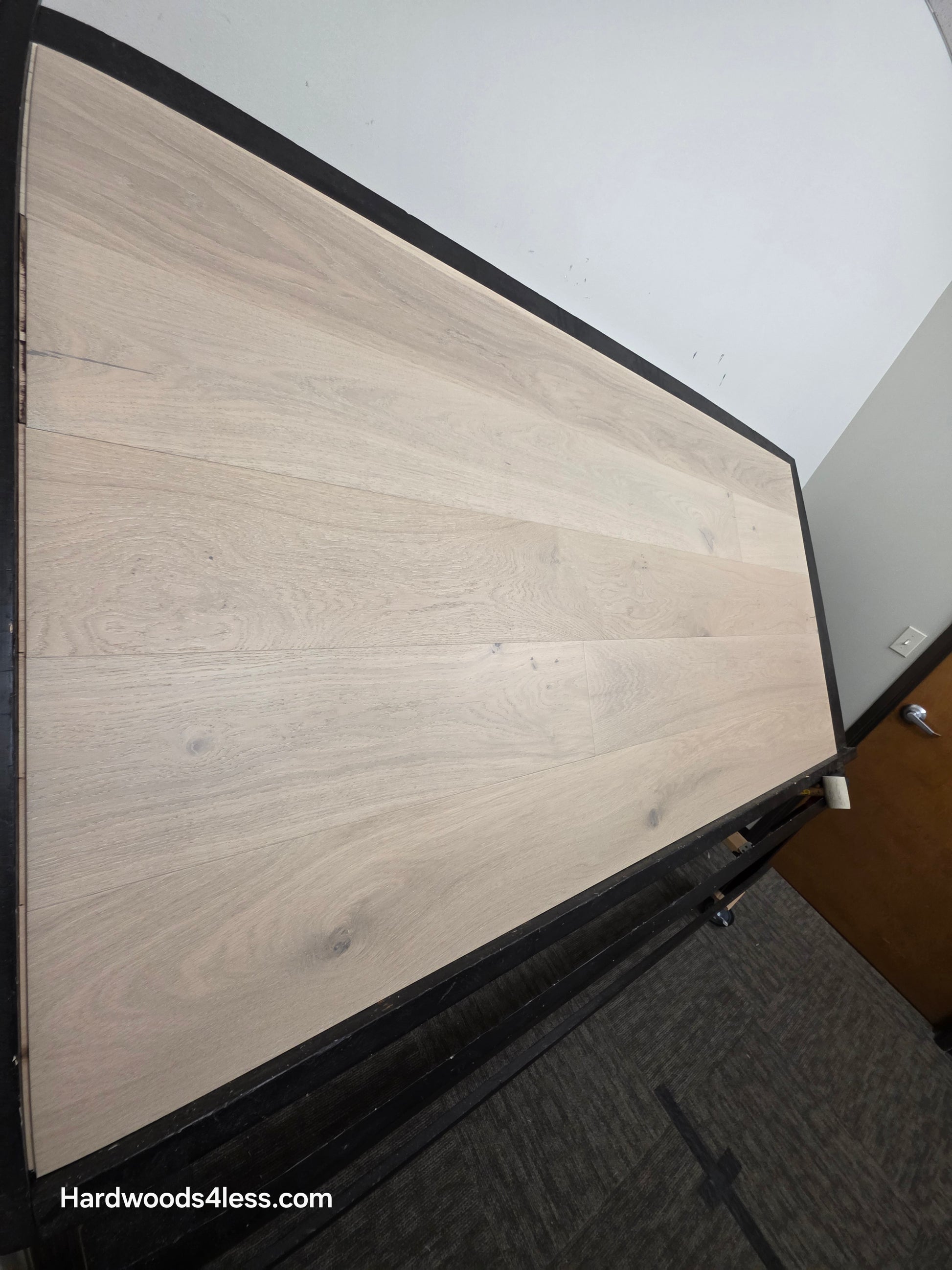 8.66" x 5/8" Engineered European Oak Solana Stain Hardwood Flooring. Shown on a black shooting table. Shot from Steep left. 
