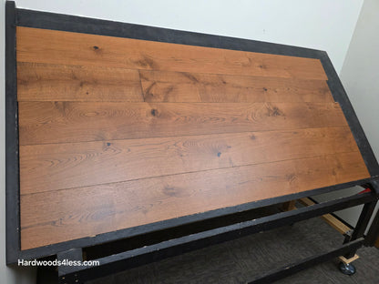 8 1/4" x 9/16" Engineered European Oak Corinth Hardwood Flooring. Shown on a black shooting rack. shot low left.