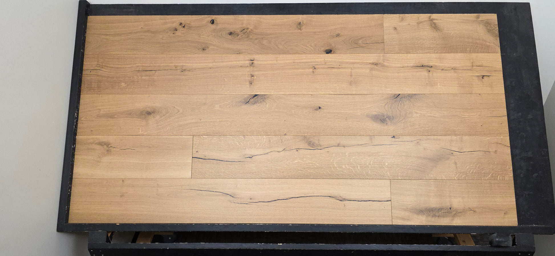 European White Oak hardwood flooring on a black racking table