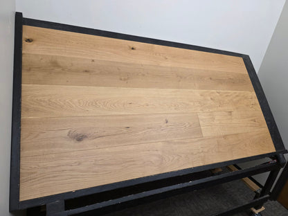 8 5/8" x 5/8" Engineered European Oak Buckwheat Hardwood Flooring shown on a black shooting table. Left side wide shot