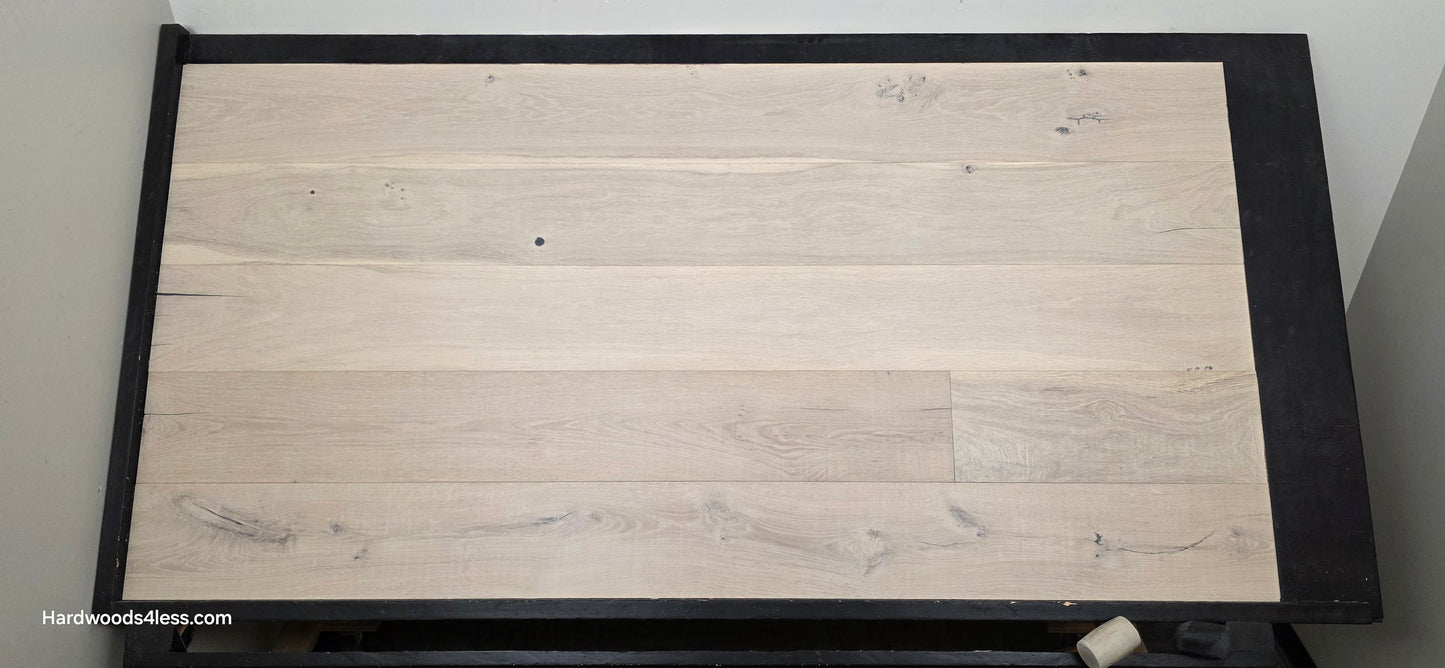 8 5/8" x 5/8" Engineered European Oak Granacci Hardwood Flooring. Shown on a black shooting table. Shot from center.