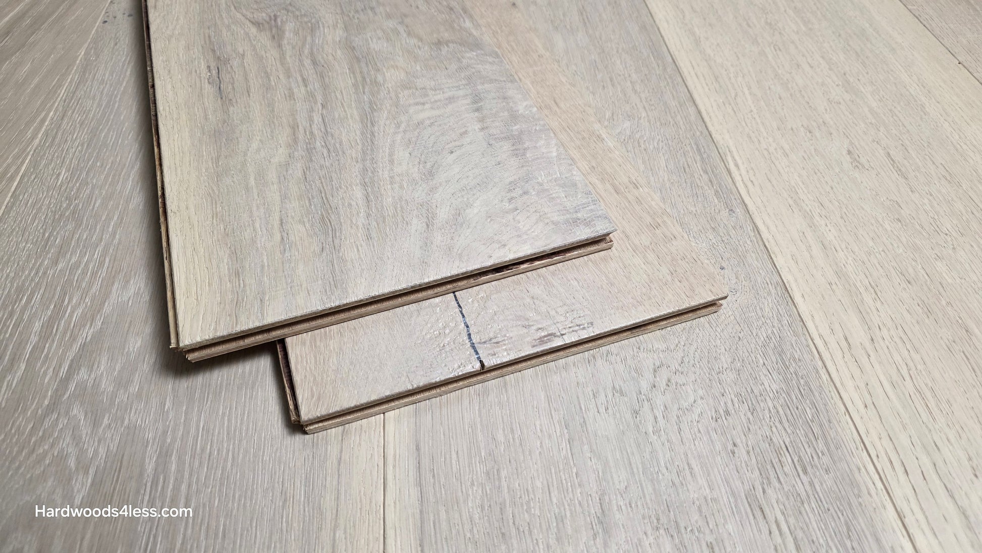 8 5/8" x 5/8" Engineered European Oak Granacci Hardwood Flooring. Shown as 2 planks stacked on top of the engineered white oak flooring.