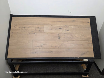 8 5/8" x 5/8" Engineered European Oak Highball Hardwood Flooring. Shown on a black shooting table. Shot from center.