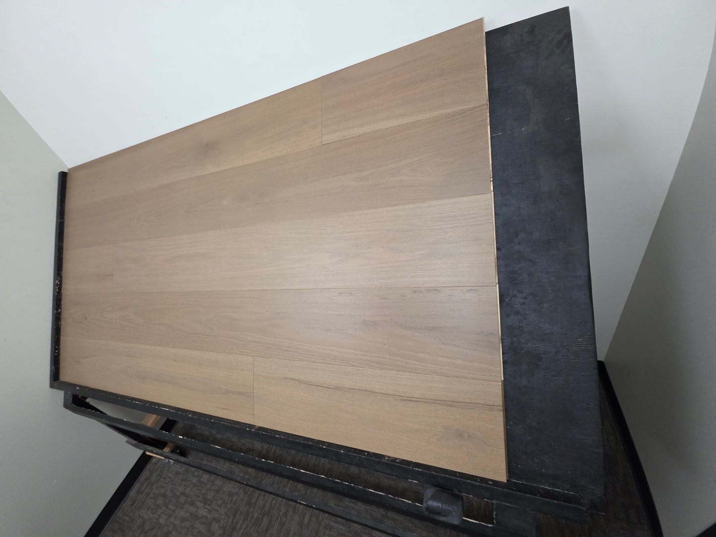 Engineered Red Oak Umbriel Hardwood Flooring on a black shooting rack right angle steep shot