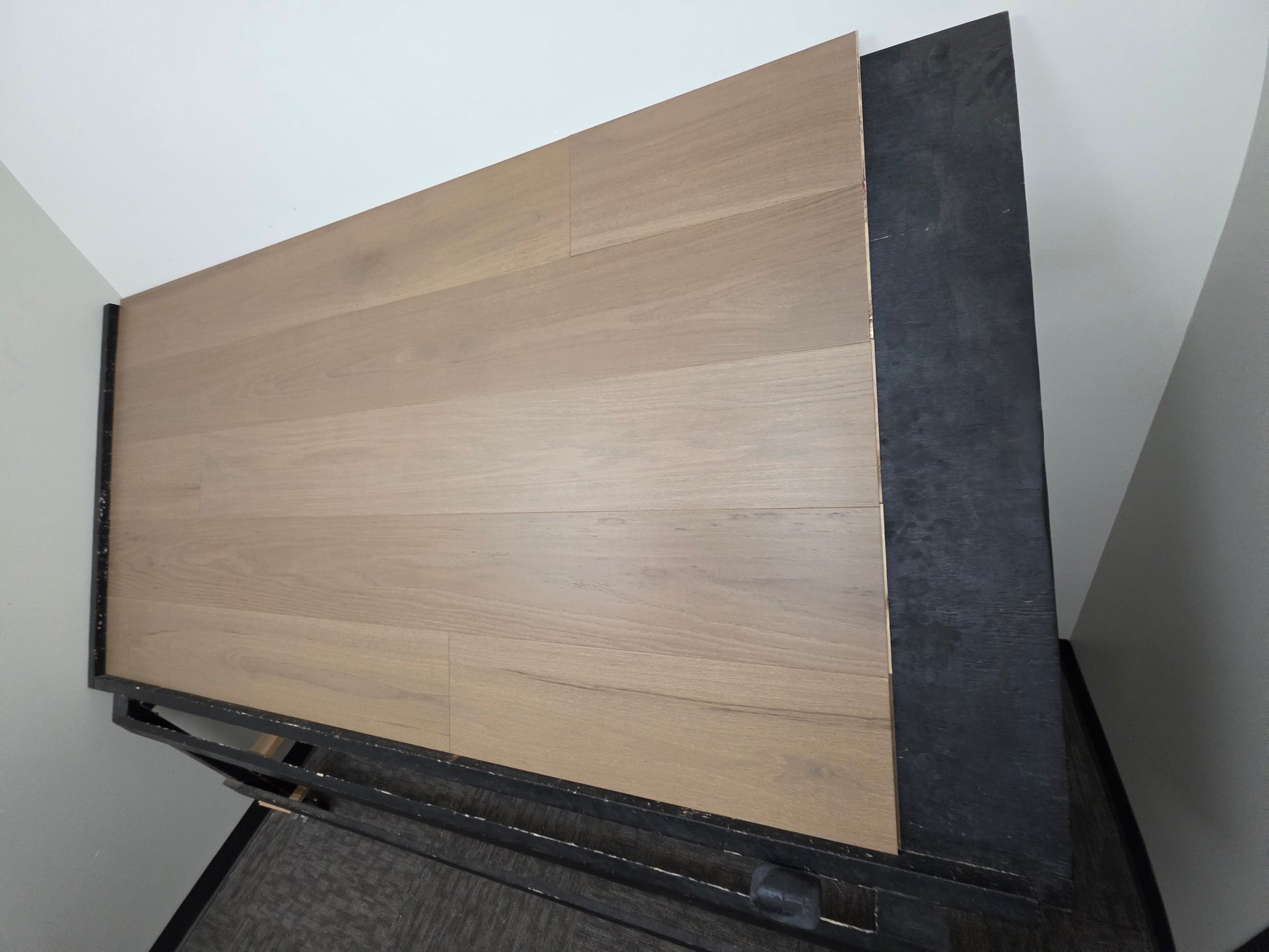 Engineered Red Oak Umbriel Hardwood Flooring on a black shooting rack right angle steep shot