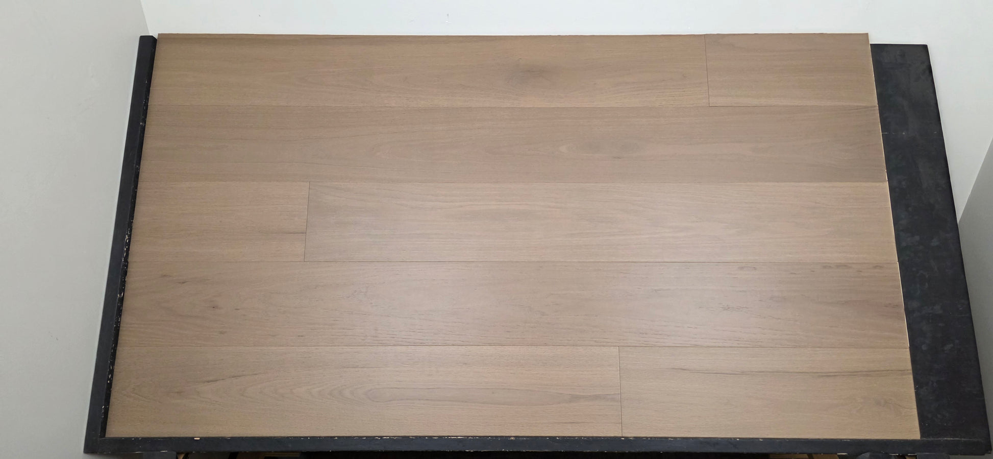 Engineered Red Oak Umbriel Hardwood Flooring on a black shooting rack close up head on shot