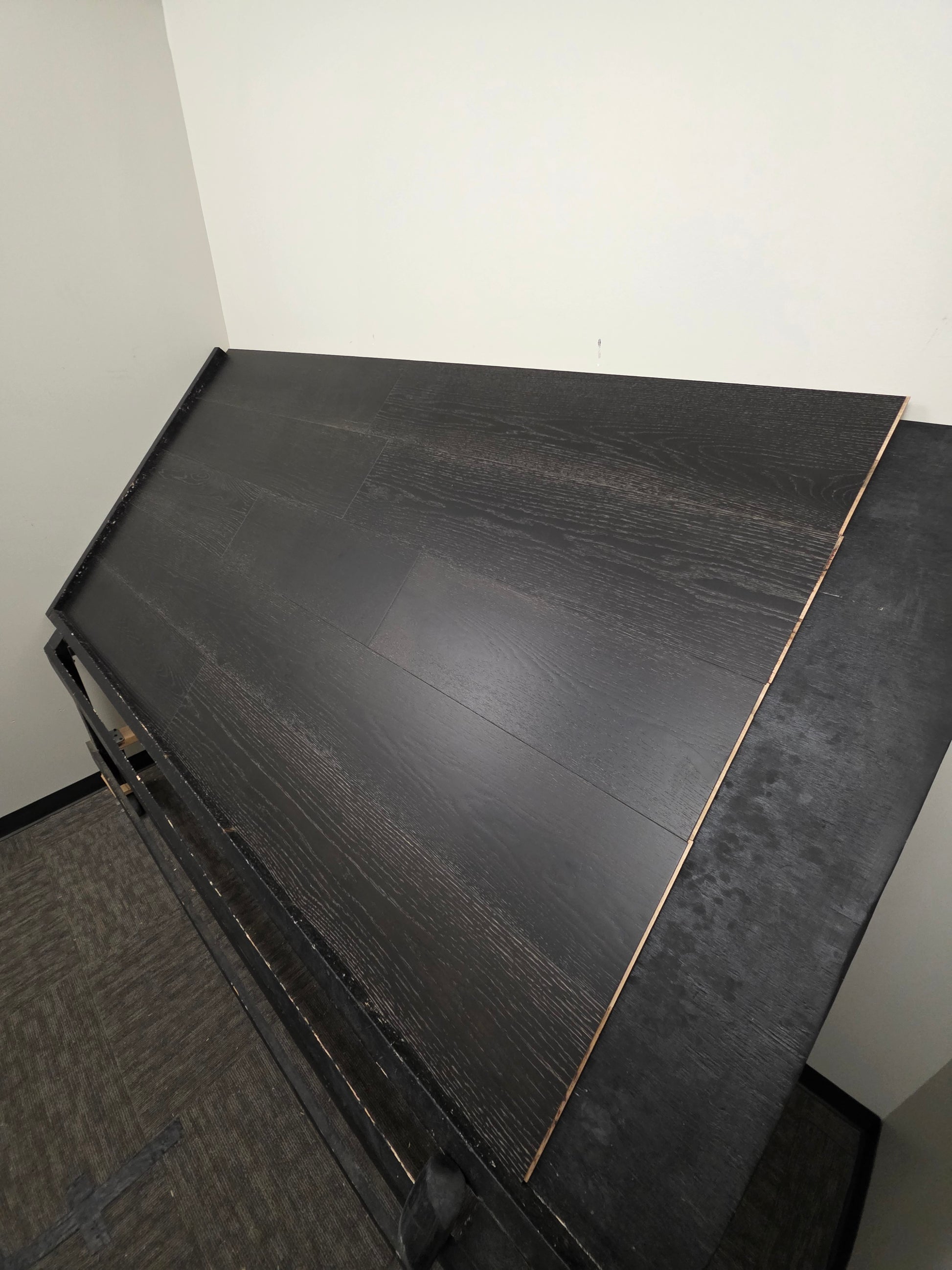 9 1/2" x 5/8" Engineered Red Oak Uriel Hardwood Flooring high shot right angle on a black shooting table