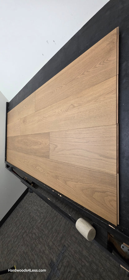9 1/2" x 3/4" Engineered European Oak Albion Hardwood Flooring. Show on a black shooting table. Shot from steep right.
