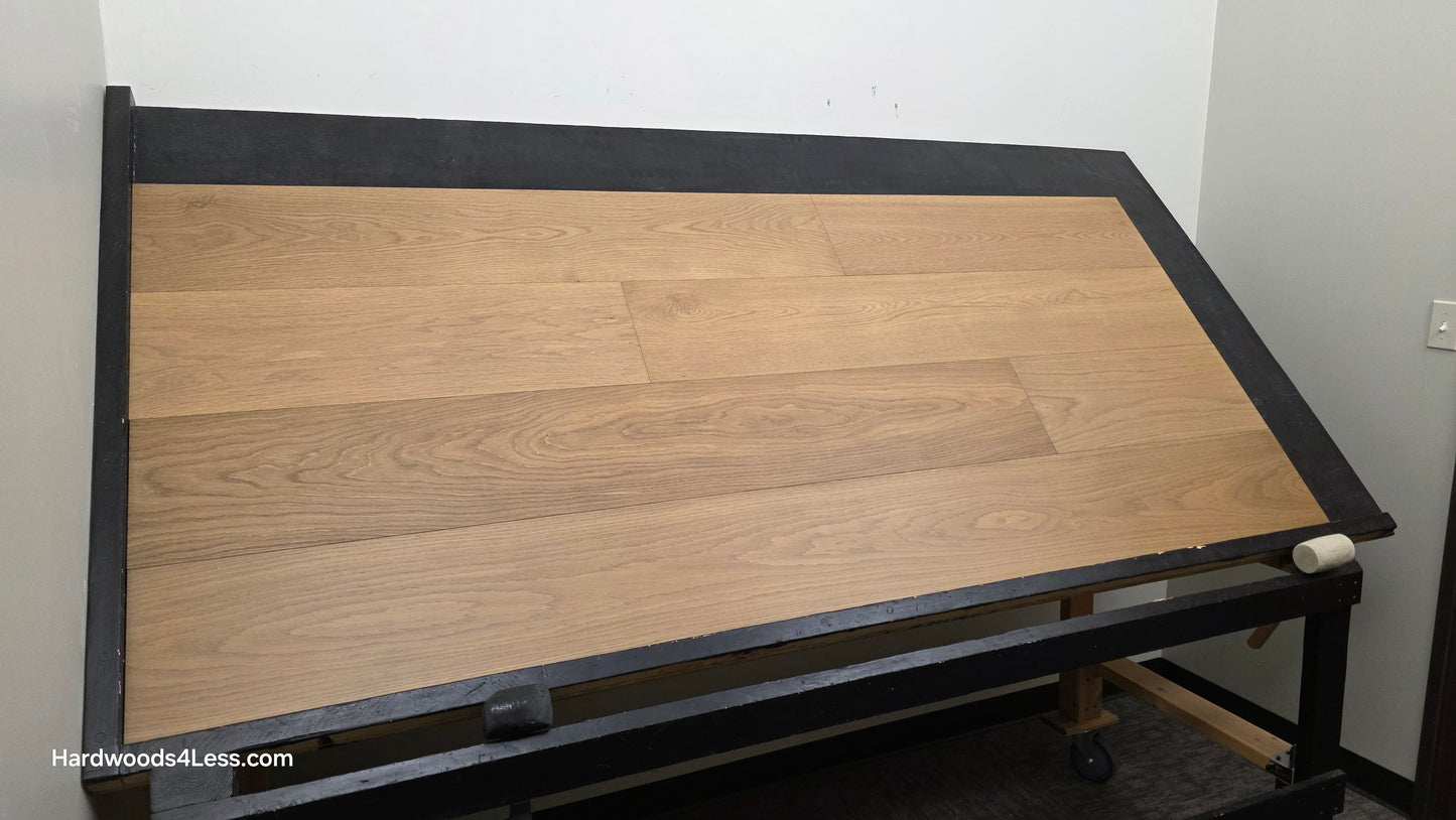 9 1/2" x 3/4" Engineered European Oak Albion Hardwood Flooring. Show on a black shooting table. Shot from wide left.