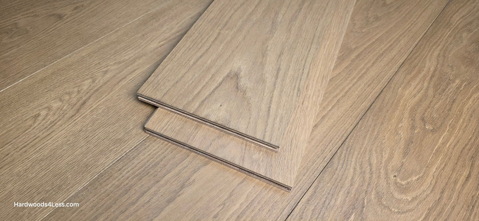 9 1/2" x 3/4" Engineered European Oak Albion Hardwood Flooring. Show as 2 planks of the wood flooring stacked on top of the engineered european oak flooring. 
