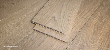 9 1/2" x 3/4" Engineered European Oak Albion Hardwood Flooring. Show as 2 planks of the wood flooring stacked on top of the engineered european oak flooring. 