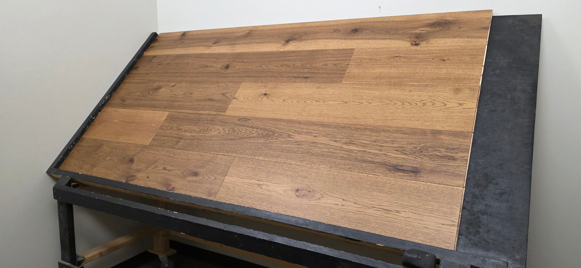 9 1/2" x 5/8" Engineered Hickory Andrews Hardwood Flooring on a black shooting table right angle shot