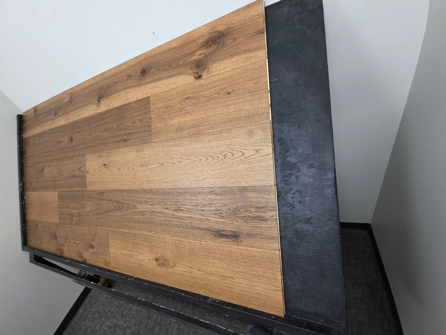 9 1/2" x 5/8" Engineered Hickory Andrews Hardwood Flooring on a black shooting table steep right angle shot