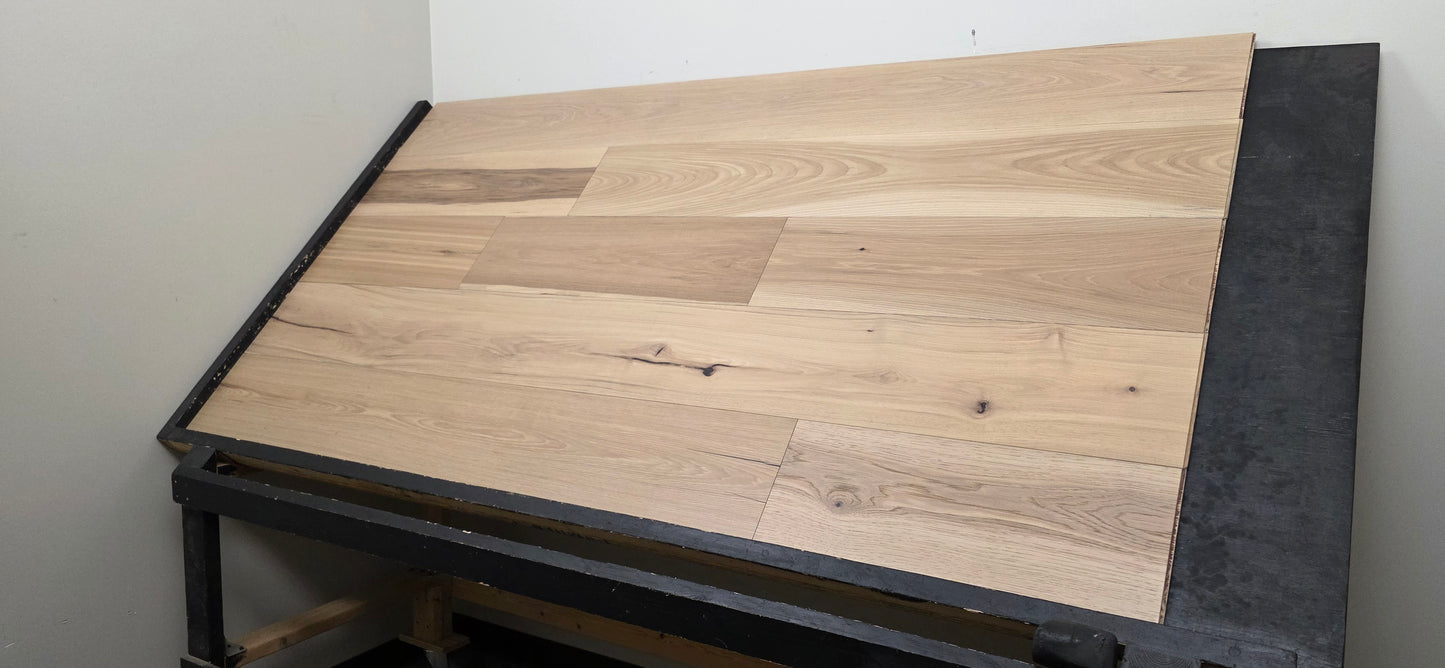 9 1/2" x 5/8" Engineered Hickory Chapman Hardwood Flooring on a black shooting rack shot from the right hand side/