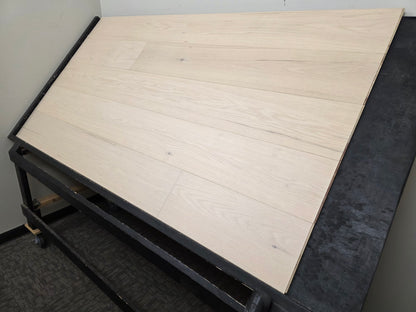 9 1/2" x 5/8" Engineered Red Oak Initium Hardwood Flooring on a black shooting table. wide angle right side shot
