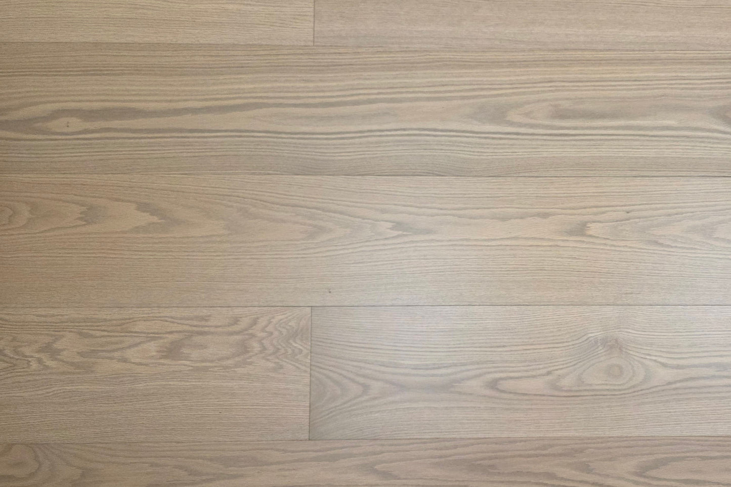 9 1/2" x 5/8" Engineered White Oak Finch Hardwood Flooring. Shown close up.