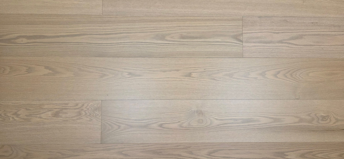 9 1/2" x 5/8" Engineered White Oak Finch Hardwood Flooring. Shown close up wide aspect ratio/