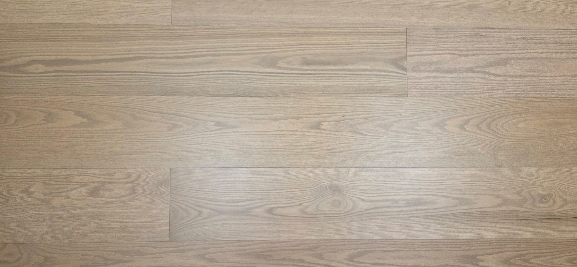 9 1/2" x 5/8" Engineered White Oak Finch Hardwood Flooring. Shown close up wide aspect ratio/