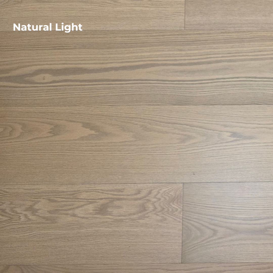 9 1/2" x 5/8" Engineered White Oak Finch Hardwood Flooring. Shown in Natural lighting. 