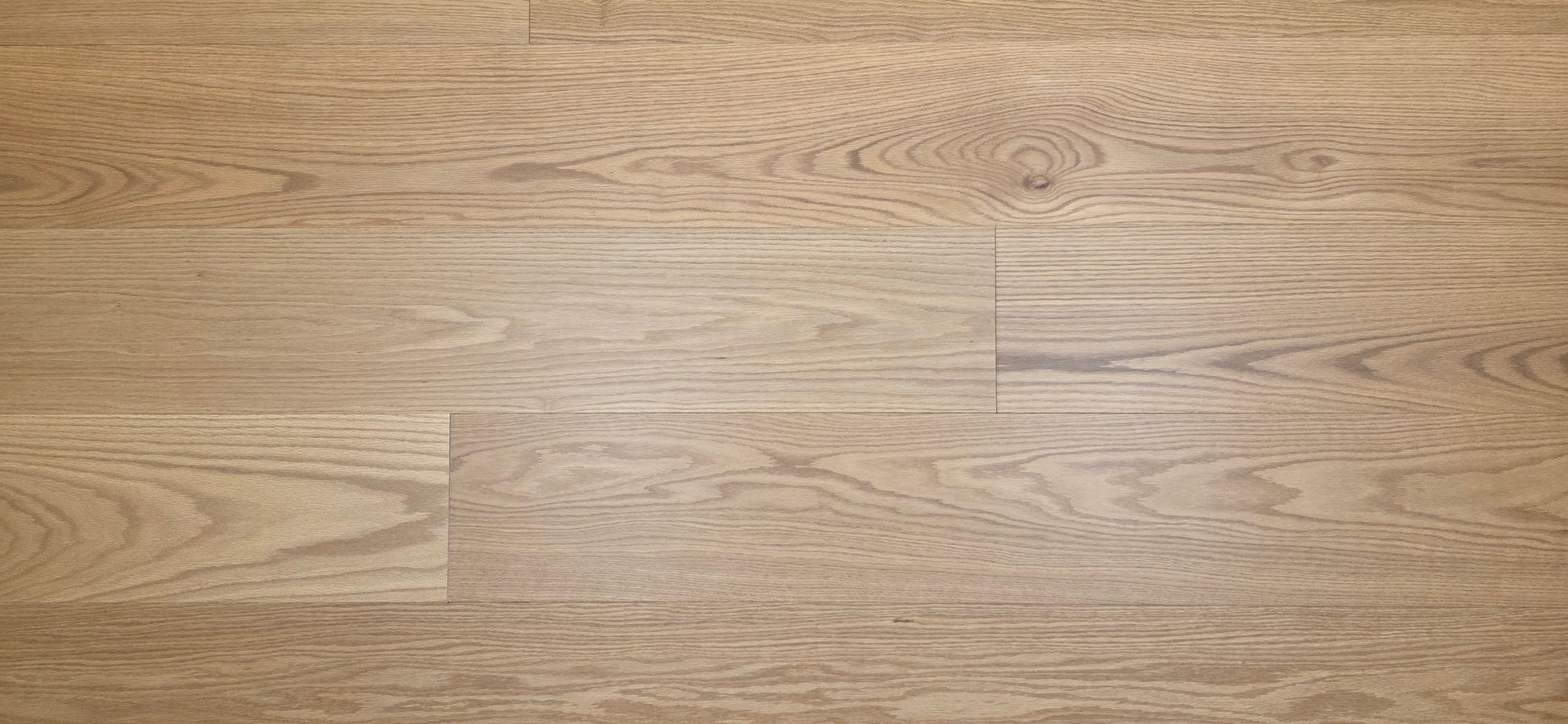 9 1/2" x 5/8" Engineered White Oak Wren Hardwood Flooring shown close up.