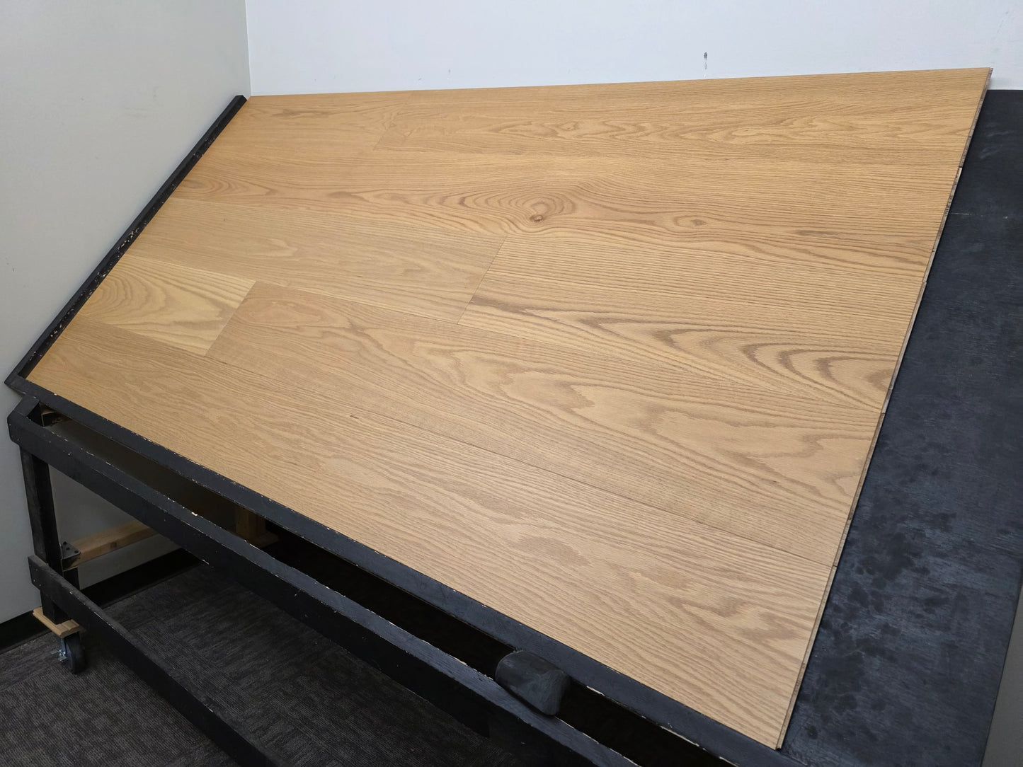 9 1/2" x 5/8" Engineered White Oak Wren Hardwood Flooring shown shot from the right hand side. Wide angle. 
