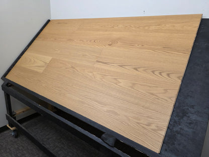 9 1/2" x 5/8" Engineered White Oak Wren Hardwood Flooring shown shot from the right hand side. Wide angle. 