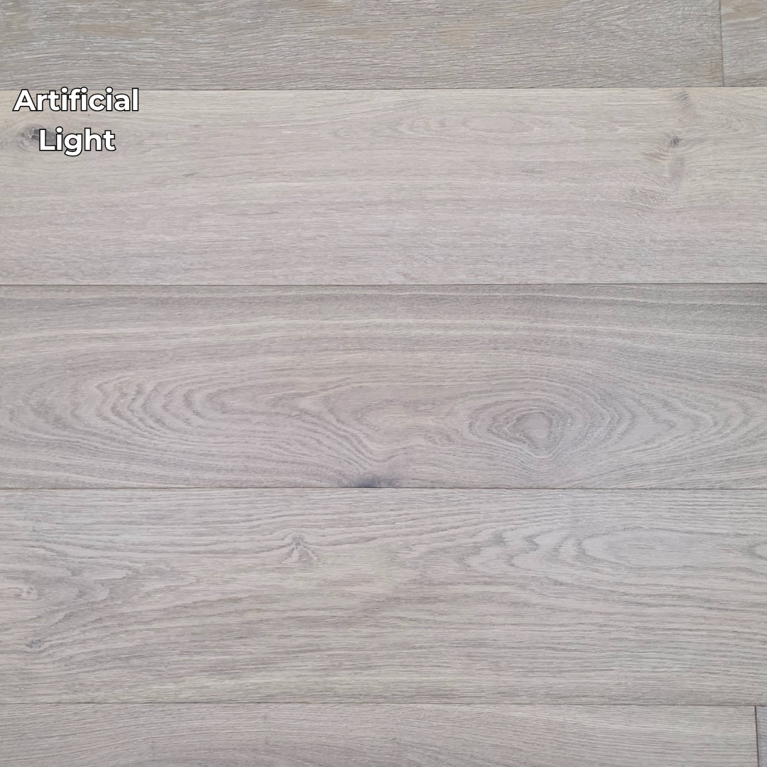 9 1/2" x 9/16" Engineered White Oak Elysian Hardwood Flooring. Shown in artificial lighting.