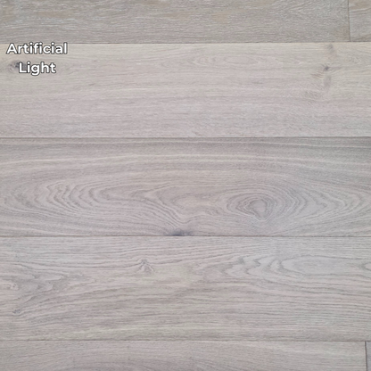 9 1/2" x 9/16" Engineered White Oak Elysian Hardwood Flooring. Shown in artificial lighting.