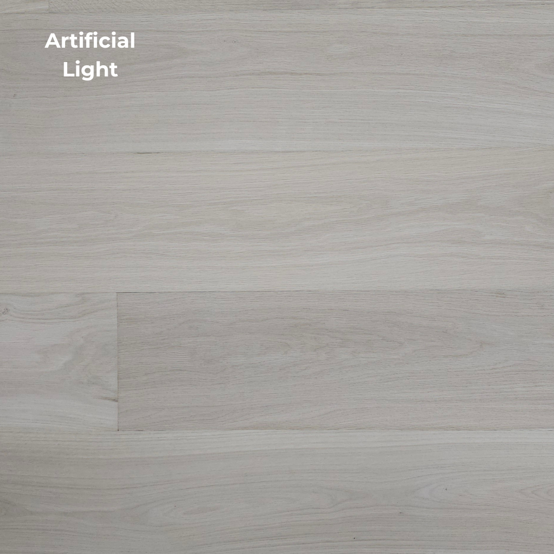 8 5/8" x 5/8" Engineered Unfinished European White Oak Select & Better Hardwood Flooring. Shown in artificial lighting. 