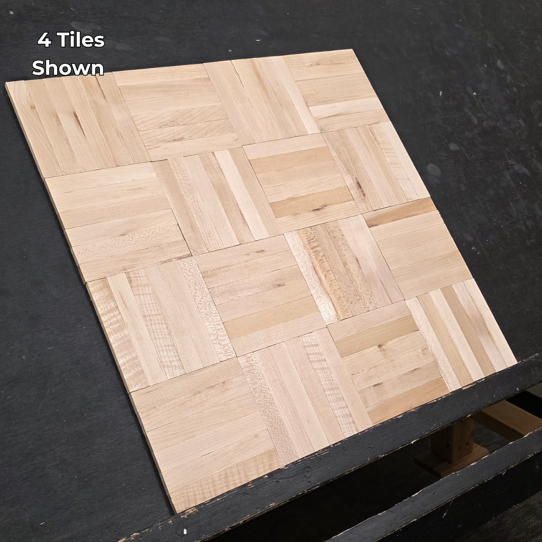 11" x 11" x 5/16" Unfinished Maple 6-slat Parquet Hardwood Flooring. Shown a 4 tiles close up on a black shooting table. 