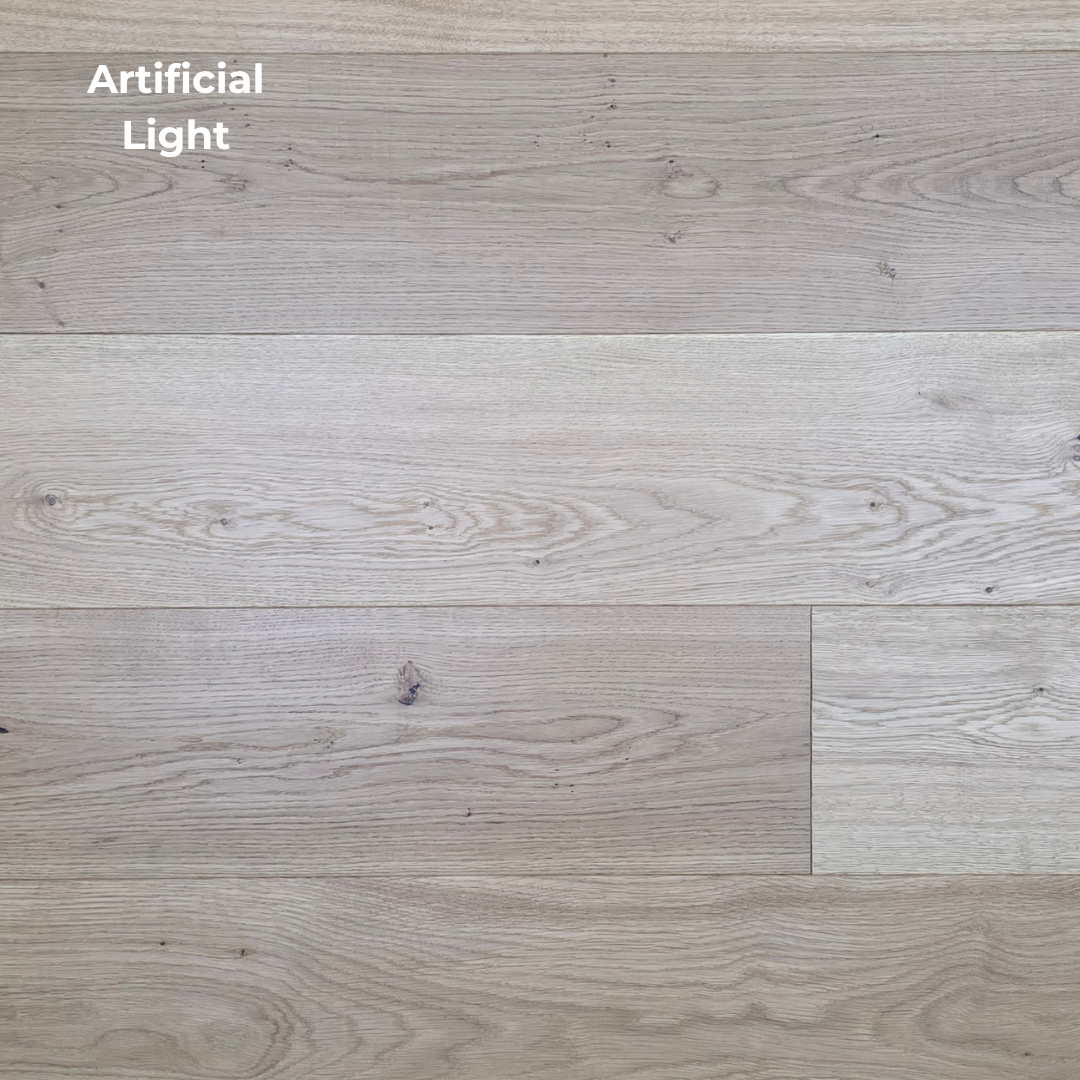 8 5/8" x 5/8" Engineered European Oak Buckwheat Hardwood Flooring shown in artificial lighting.