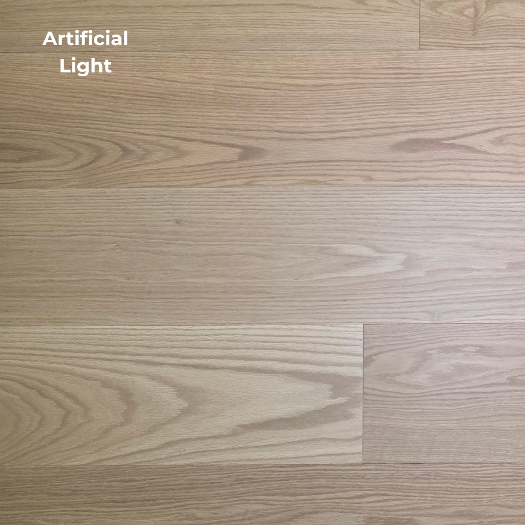 9 1/2" x 5/8" Engineered White Oak Wren Hardwood Flooring shown in Artificial lighting. 