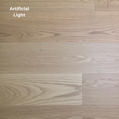 9 1/2" x 5/8" Engineered White Oak Wren Hardwood Flooring shown in Artificial lighting. 