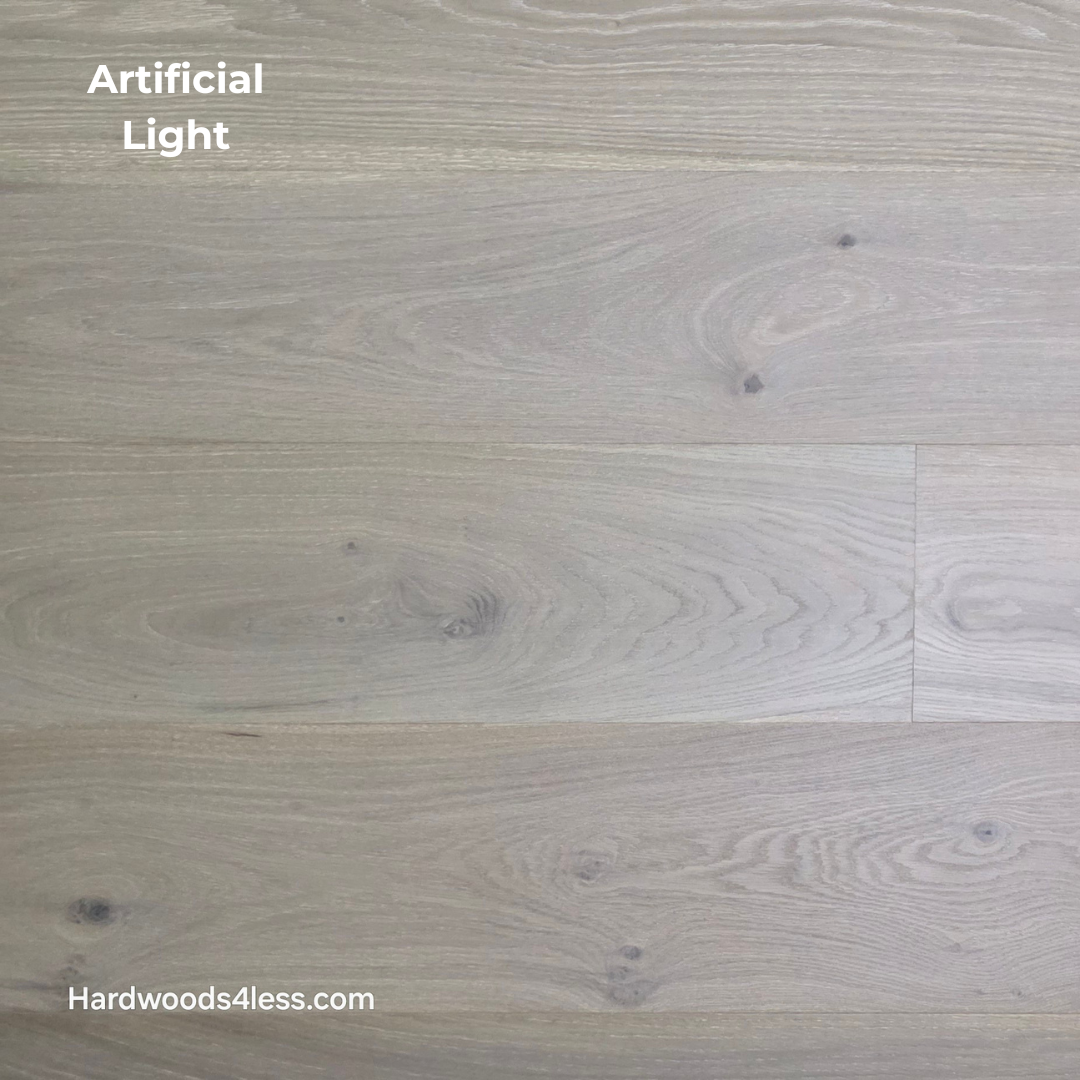 9 1/2" x 9/16" Engineered White Oak Daphne Hardwood Flooring shown in artificial lighting 