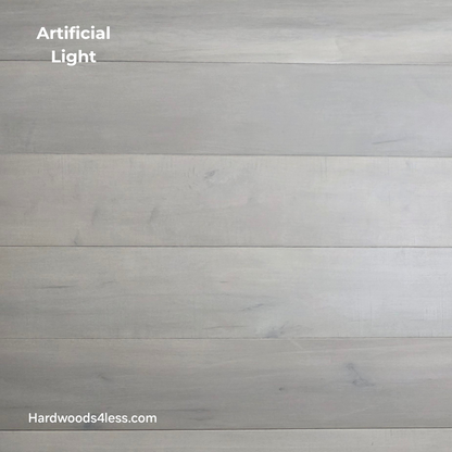 6 1/2" x 1/2" Engineered Maple Misty Moonlight Hardwood Flooring shown in artificial light.