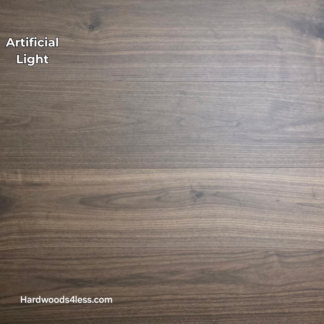 8.11" x 7/16" Modernized Engineered Walnut Calatrava Hardened Hardwood Flooring. Shown in artificial lighting.