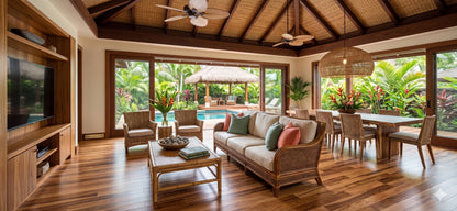 3 1/4" x 3/4" Solid Prefinished Tigerwood Hardwood Flooring. Shot from steep left. Shown as a tropical bungalo room image. 